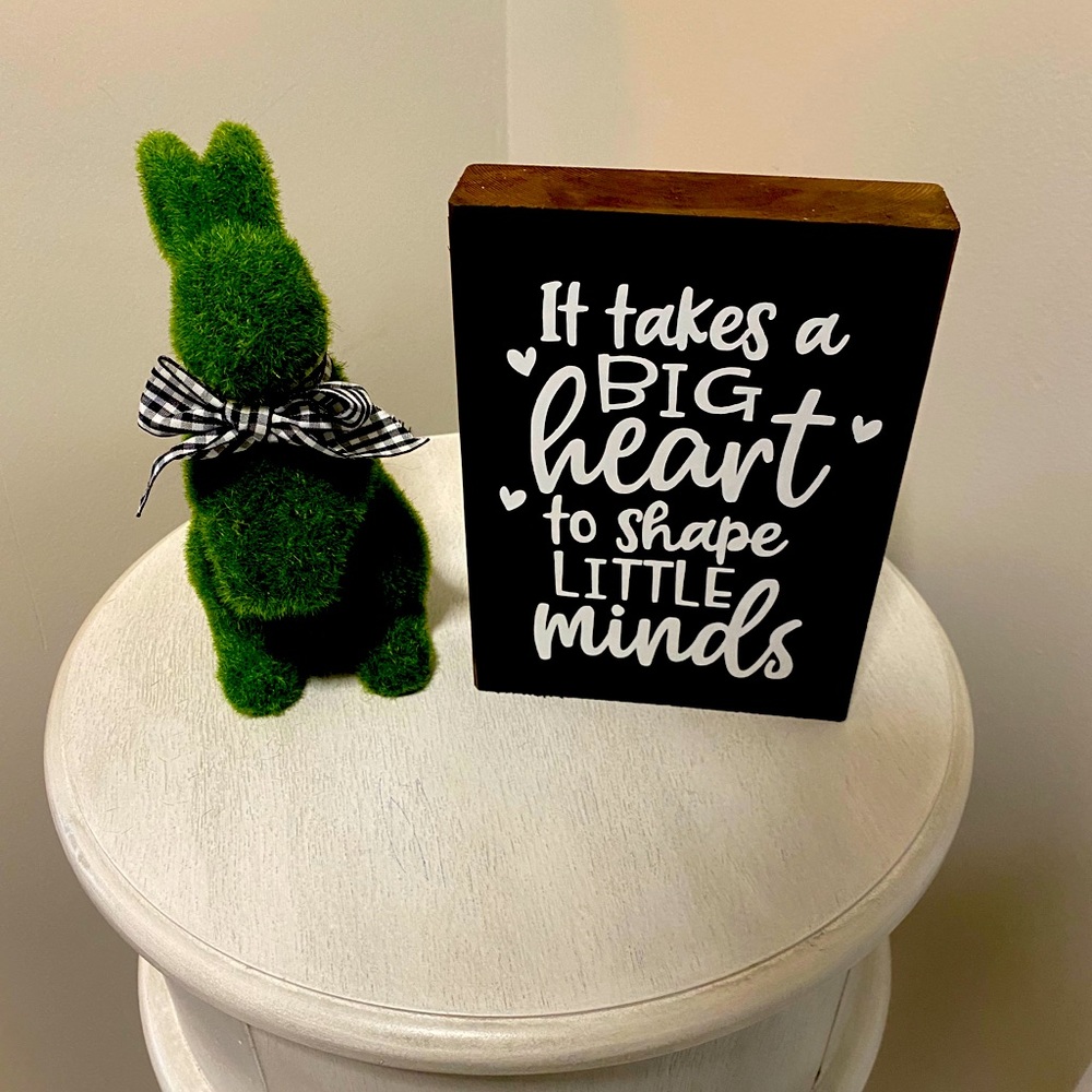 It takes a big heart to shape little minds sign